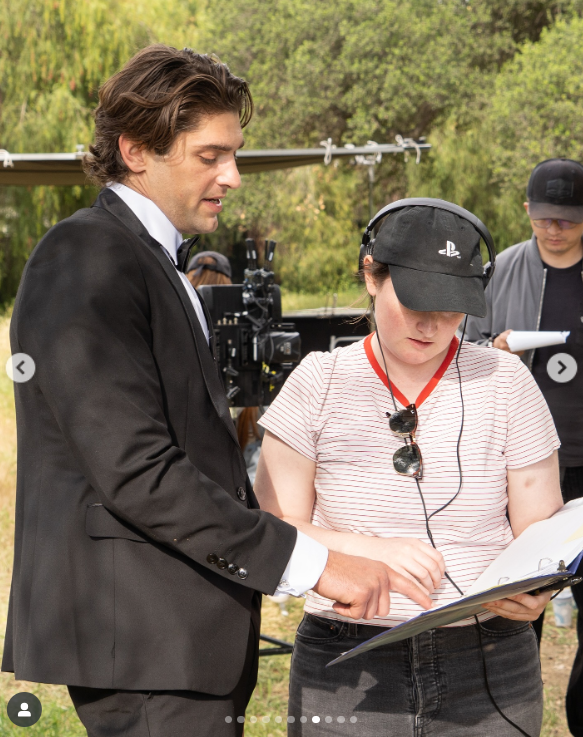 Griffin Blazi reviews the shot list with the crew on set, as posted on July 8, 2025 | Source: Instagram/dramabox_us